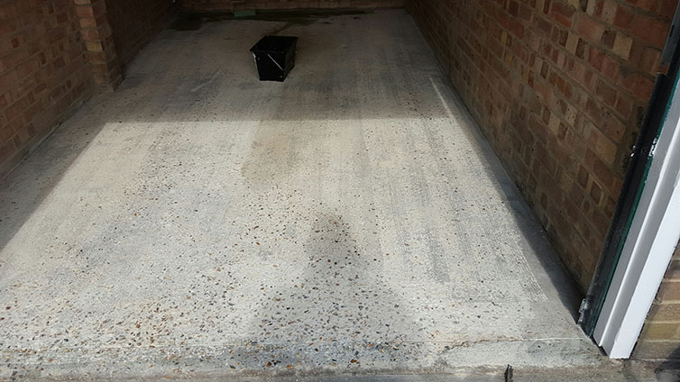After mechanical preparation to clean the old concrete.